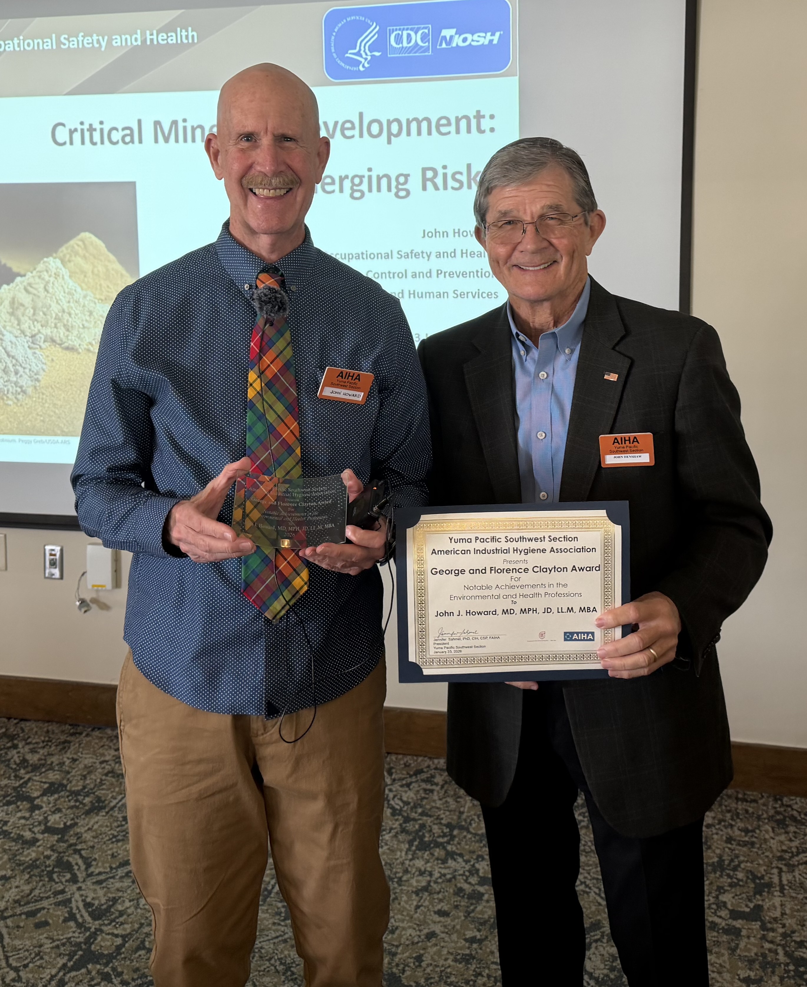 John Howard receiving Clayton Award from John Henshaw